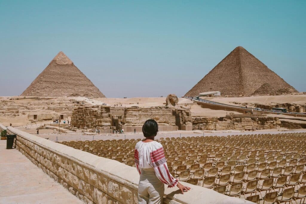 woman thinking about geometry of great pyramids