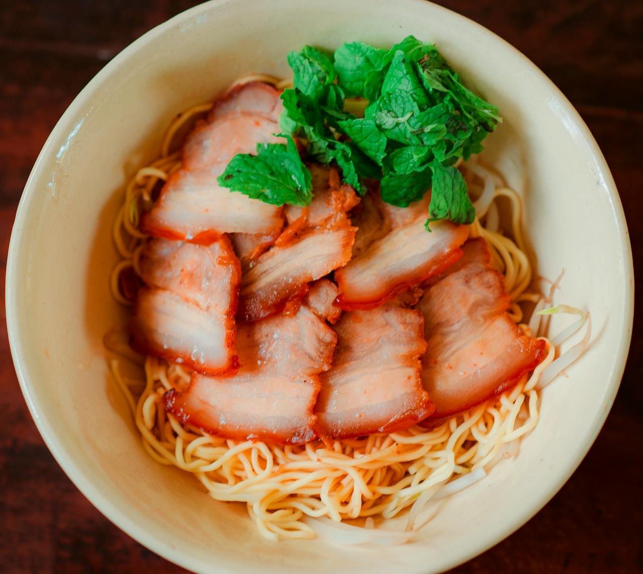 ramen noodles with meat in a bowl